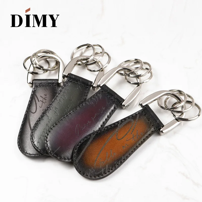

DIMY Hot Sale Genuine Leather Shoe Decorations shoehorn Wholesale Fashion Car Key Chain Steel Shoe Charm Lifter Key Ring Simple