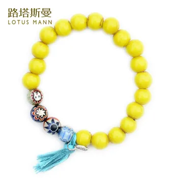 

Lotus mann Yellow glass bead colored glaze bracelet Men and women style bracelet