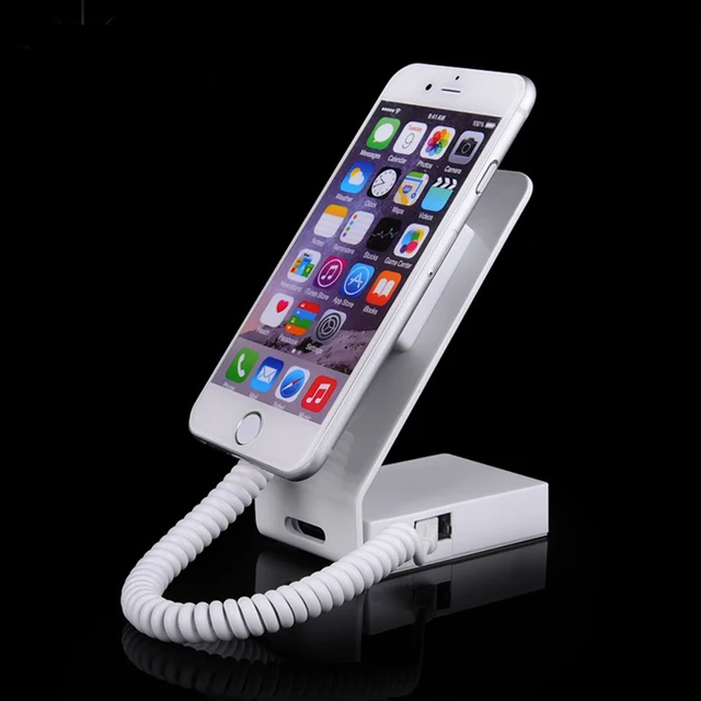 Charging and alarm cell phone security display stand