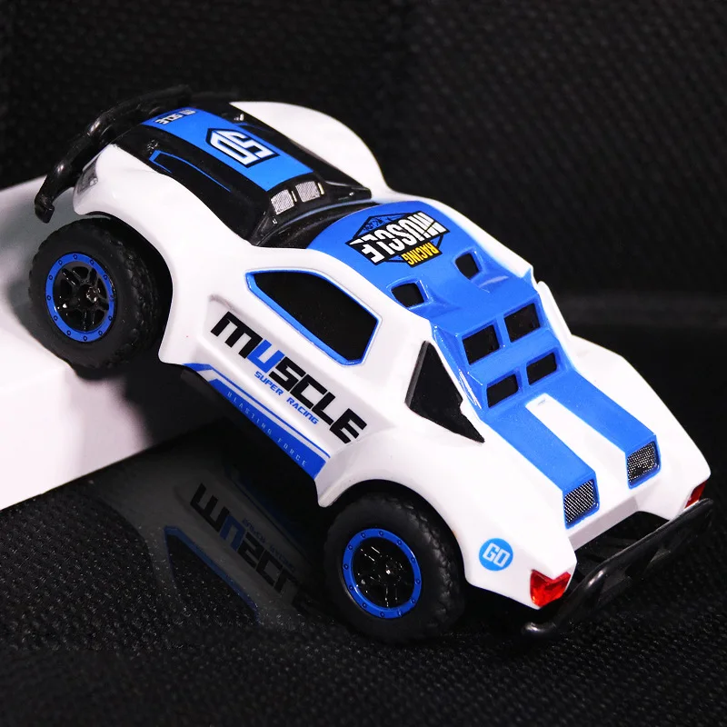 Four-wheel drive 2.4GHz 1:43 short card semi-proportional control Children s charging toy remote control car Four-wheel drive 2.4GHz 1:43 short card semi-proportional control Children s charging toy remote control car