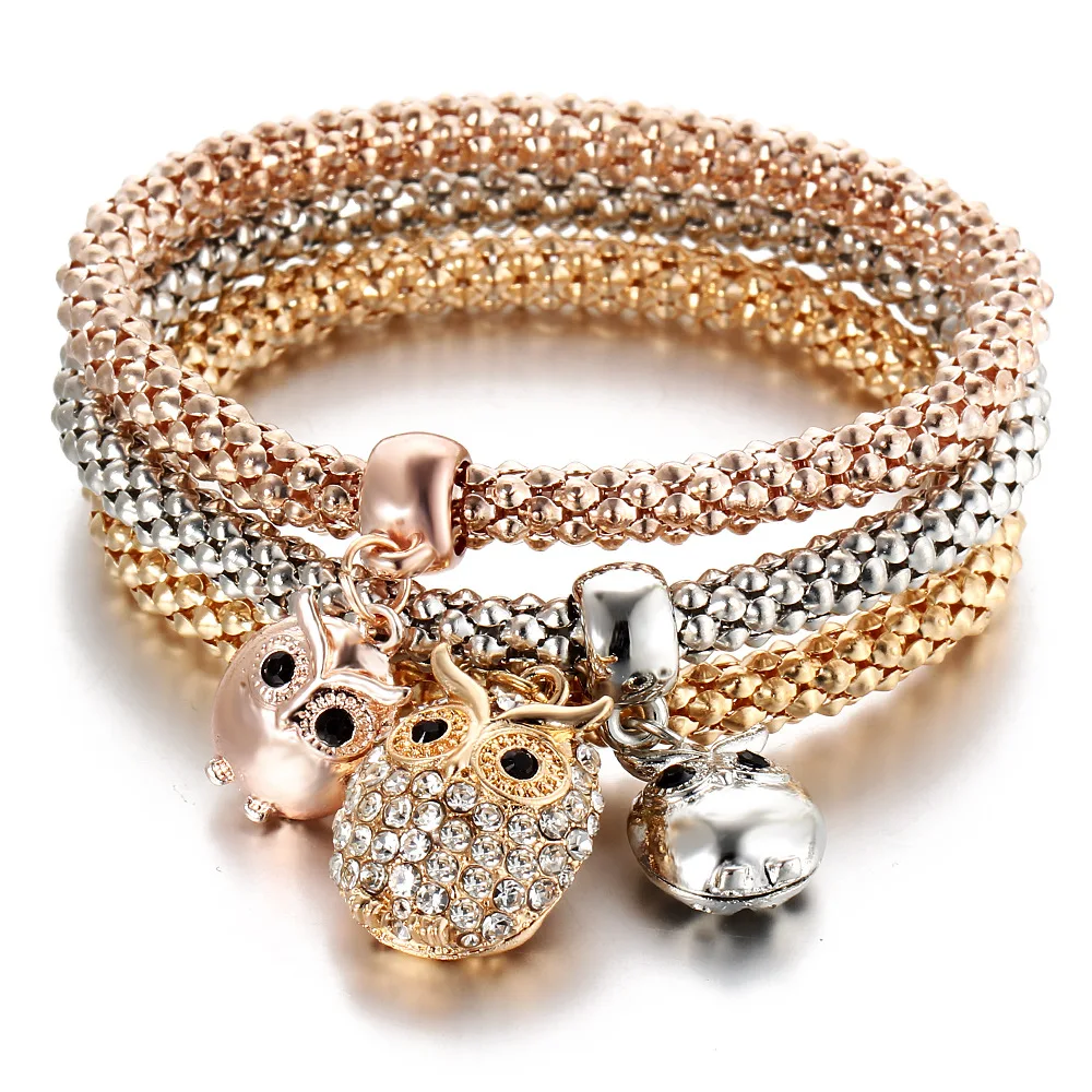 

Three-color Set of European and American Popcorn Elastic Bracelet Tree Owl Crown Elephant Anchor Jewelry Wholesale Snap Button