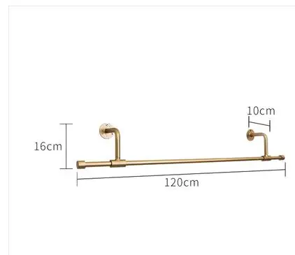 Clothing store display stand. Wall-hung in The Wall. Women's clothing store simple wrought iron gold. Side hangers.