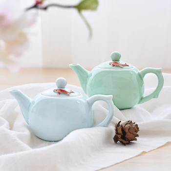 

200ML Brief Solid Color Ceramic Porcelain Teapot Handgrip Pot with Embossed Fish Lid Kit Home Drinkware Puer Black Tea Kettles