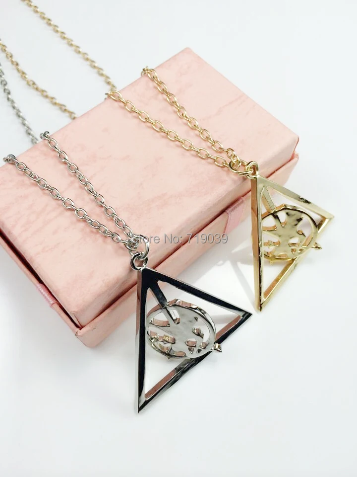 

20pcs/lot Wholesale Fashion Harry potter hunger games catching fire spin Deathly Hallows pendant Necklace spin Horcrux