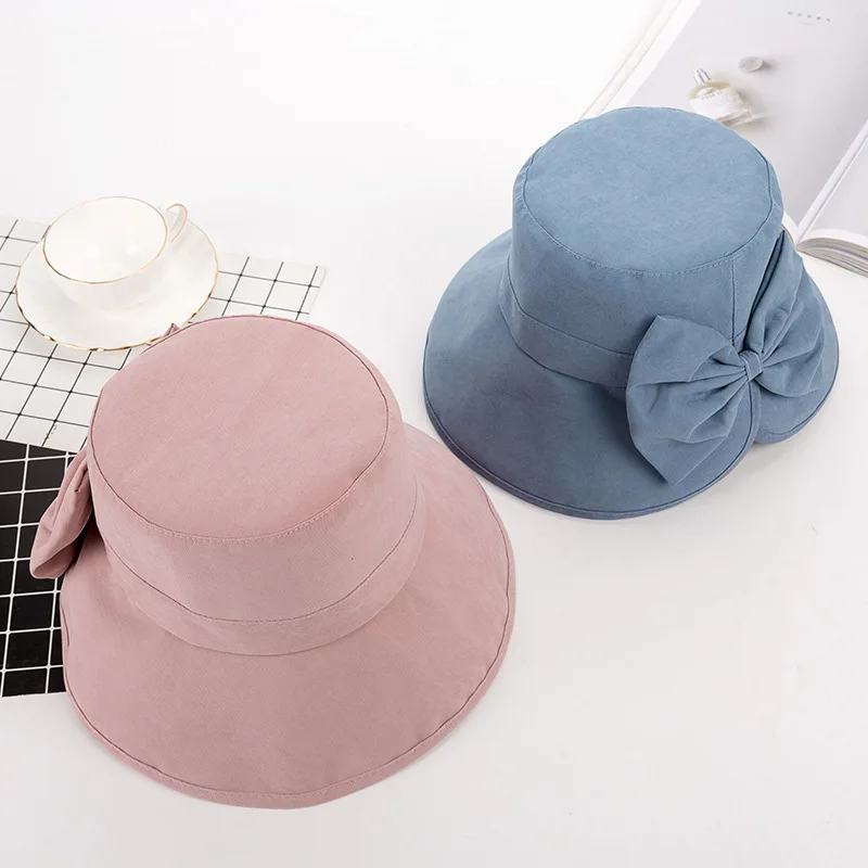 

Spring and summer Korean fisherman hat peach skin bow sunscreen visor wild cloth hat wholesale (56-58cm)