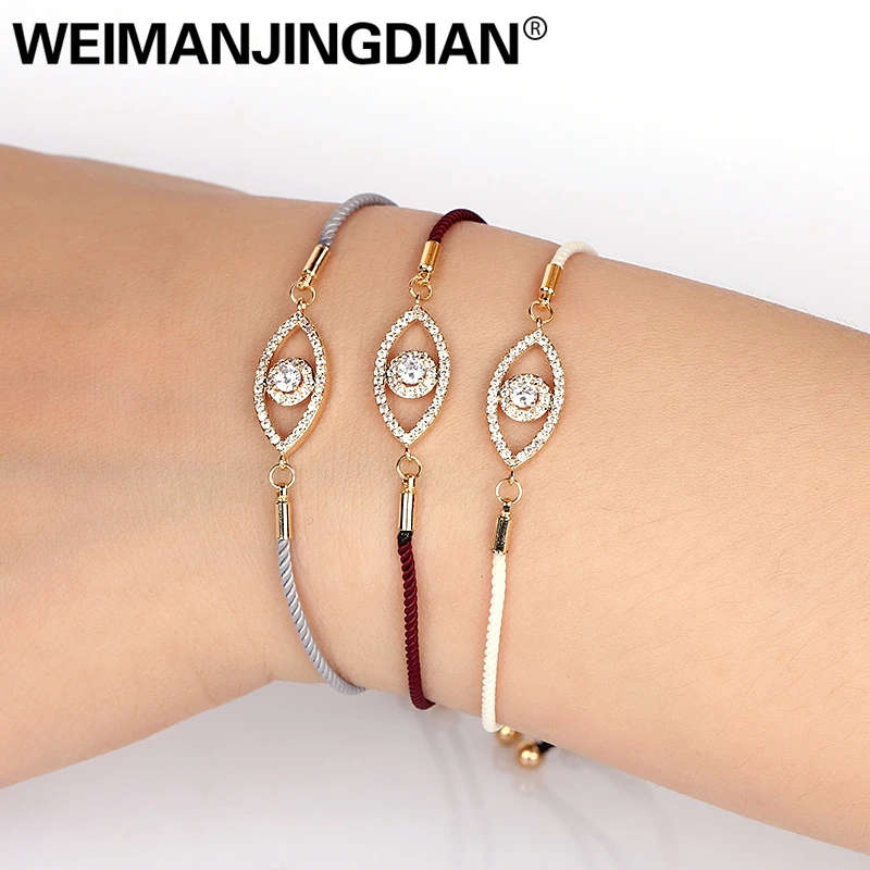 

Silver / Gold Color Plated Cubic Zirconia Crystal Pave Evil Eye Adjustable Bracelets for Women or Wedding with Wax Cord