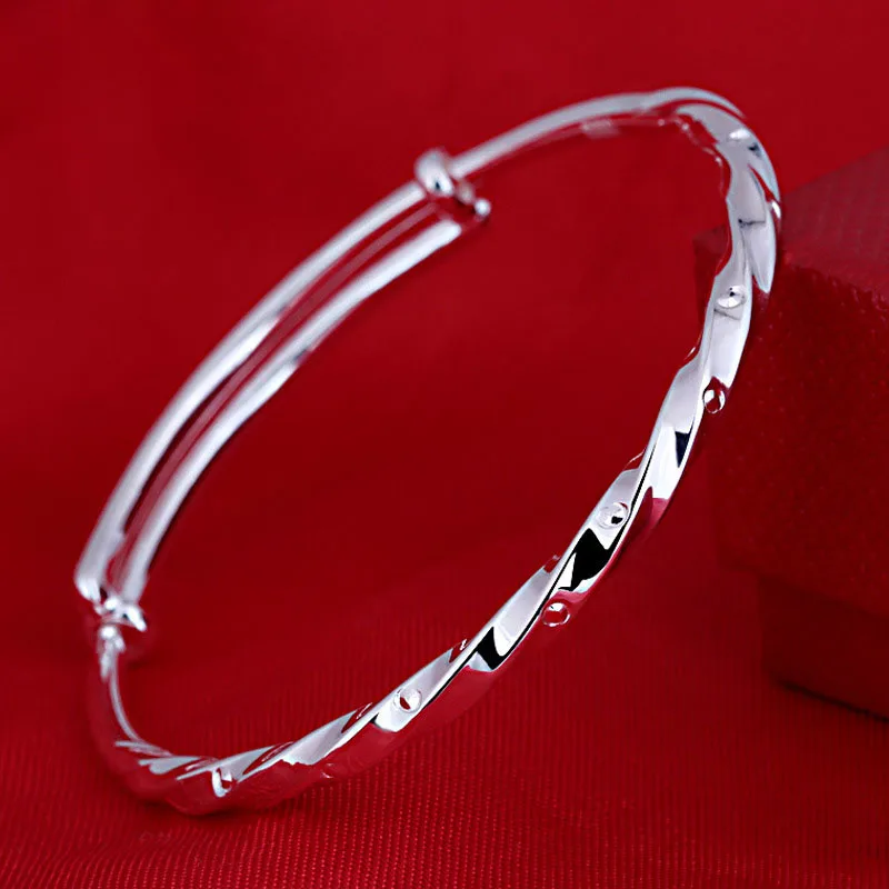 

Simple Twisted S990 Silver Adjustable Bangle