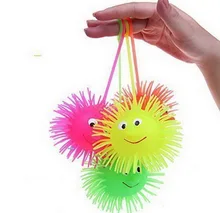 12pcs lot Flash Puffer Ball Hedgehog Ball Vent with Charged Random Color Kids Toys Novelty and