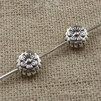 

390 pieces tibetan silver flower spacers 7x3mm #3937