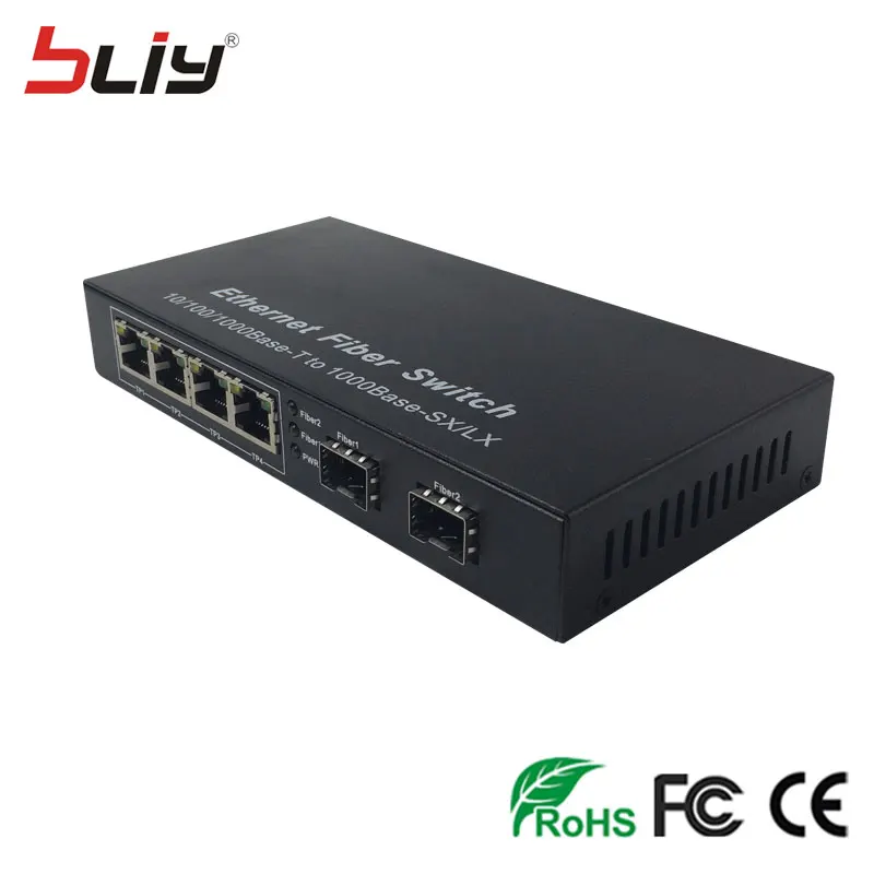 2 sfp slot fiber optical gigabit switch sfp to 4 rj45 UTP ports ethernet media converter SC single mode FTTH GPON terminal 2 sfp slot fiber optical gigabit switch sfp to 4 rj45 UTP ports ethernet media converter SC single mode FTTH GPON terminal