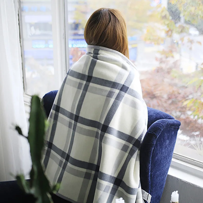 

Multi-functional double-layer lazy throw blanket moisture absorption heating blanket office and home plaid blanket wholesale
