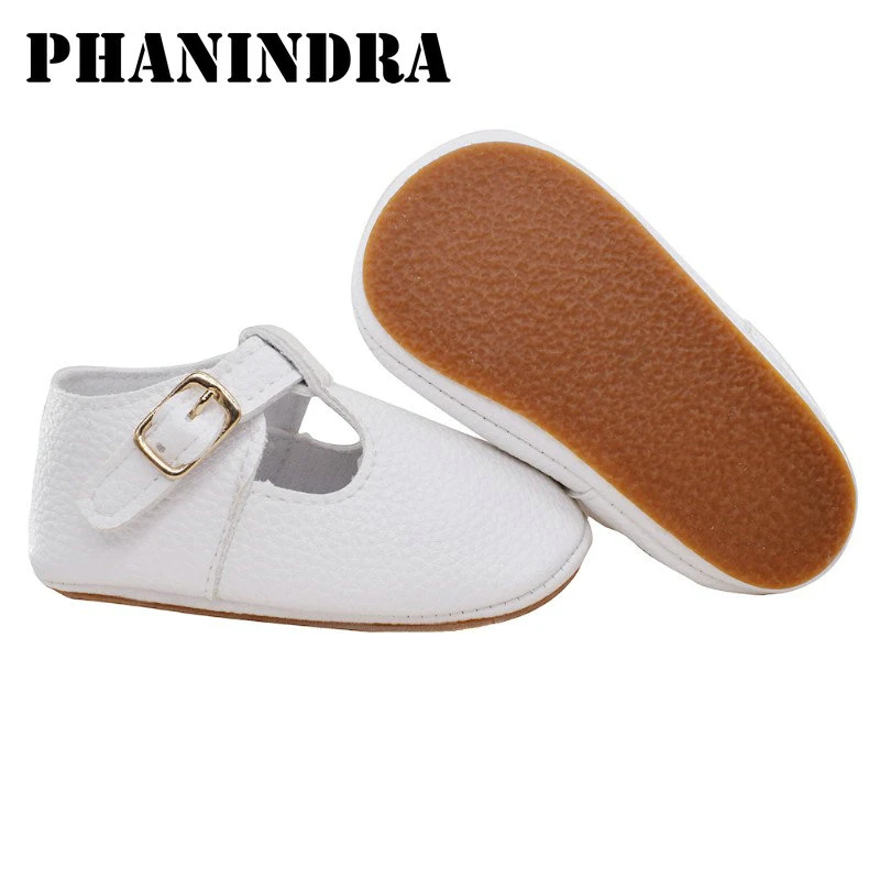 white hard sole baby shoes