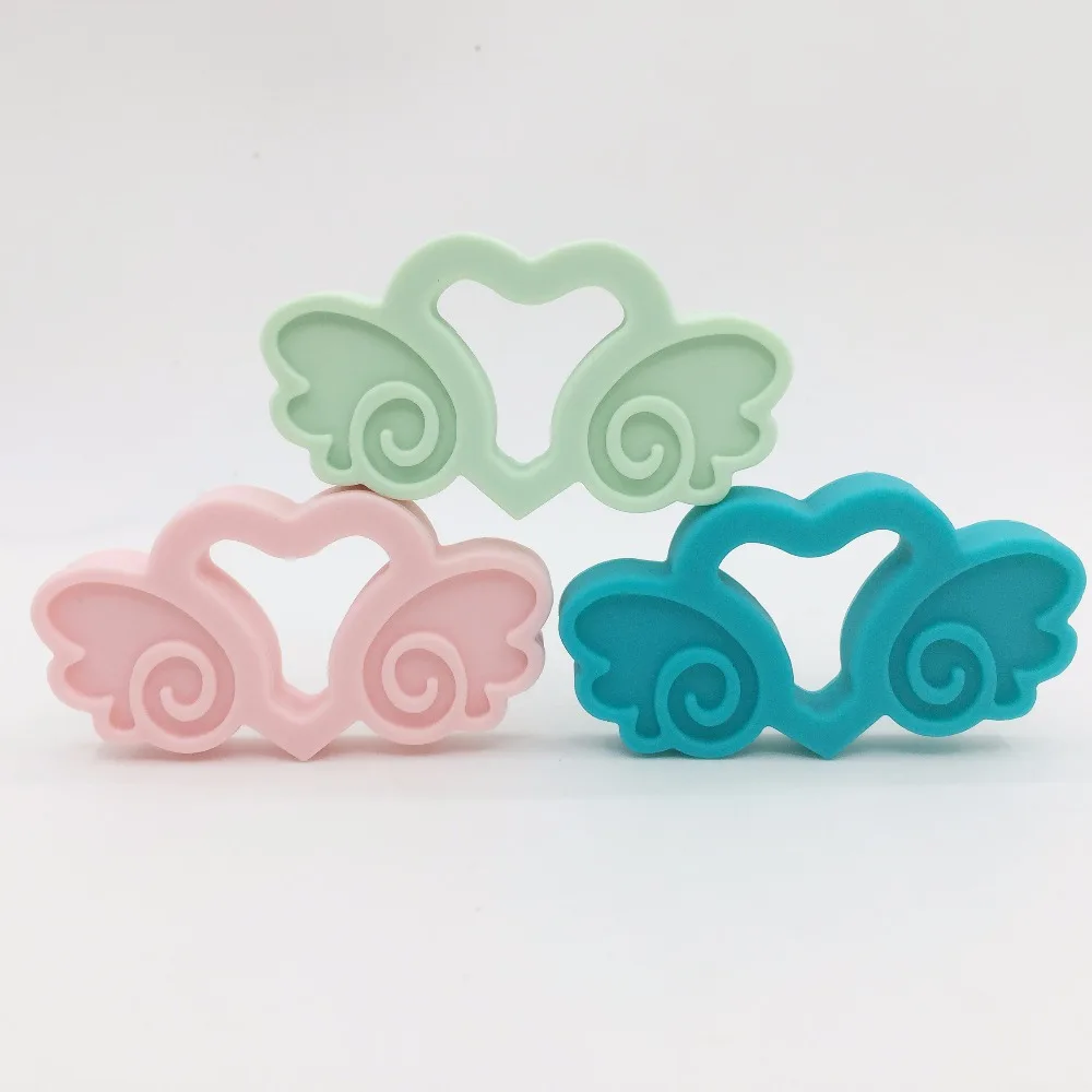 

mini Angel shape Silicone Teether ,Mini Cute Angel fly design Silicone teether for baby chew 10pcs /lot Free shipping