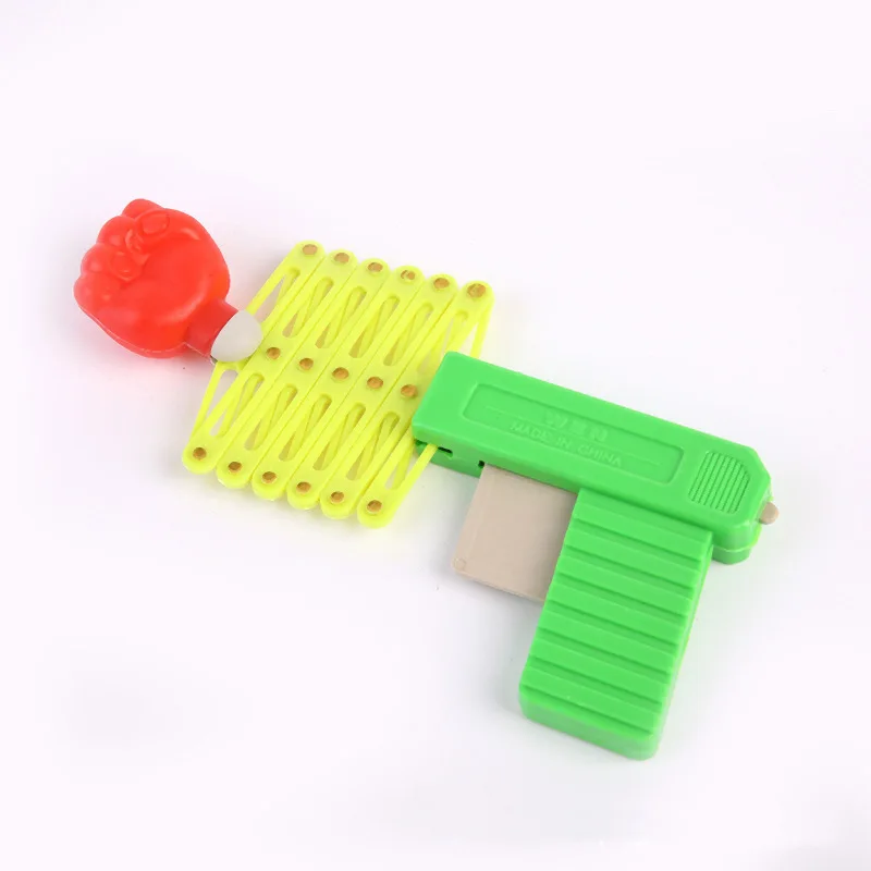 

Magic Trick Gags Practical Jokes Telescopic Fist Gun Bullet Gun Children's Toy Funny Magic Gun Strong Elasticity Practical Jokes