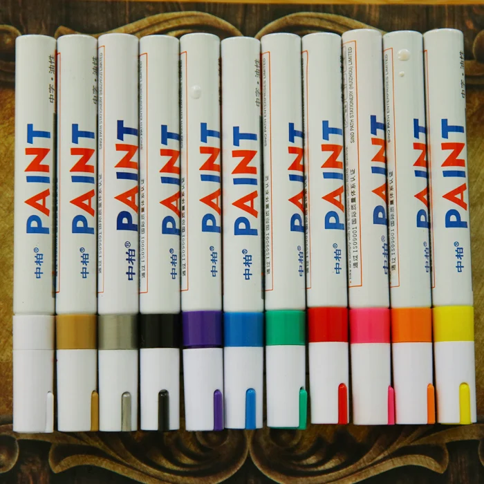 Маркер записи. Фото с лежащим paint marker &о горизонтали. Маркер записи. Маркер записи. Запись позиции.