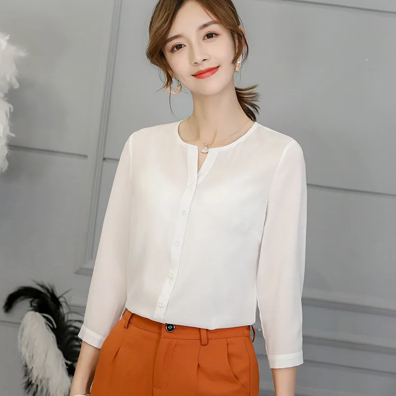 camisa blanca manga tres cuartos