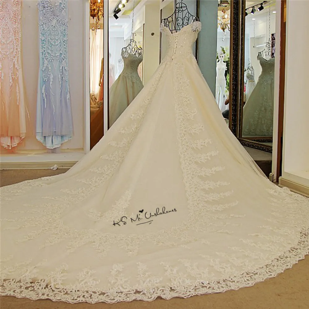 Удивительные церковные Свадебные платья с длинным шлейфом Abiti Da Sposa кружевные