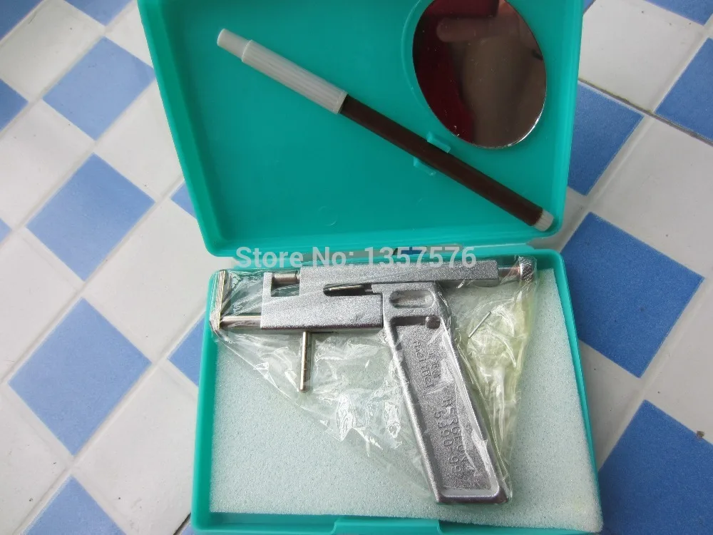 

FREE SHIPPING ear piercing studs gun, Ear pistol, jewelry making tools,earing gun,ear hole drilling machine