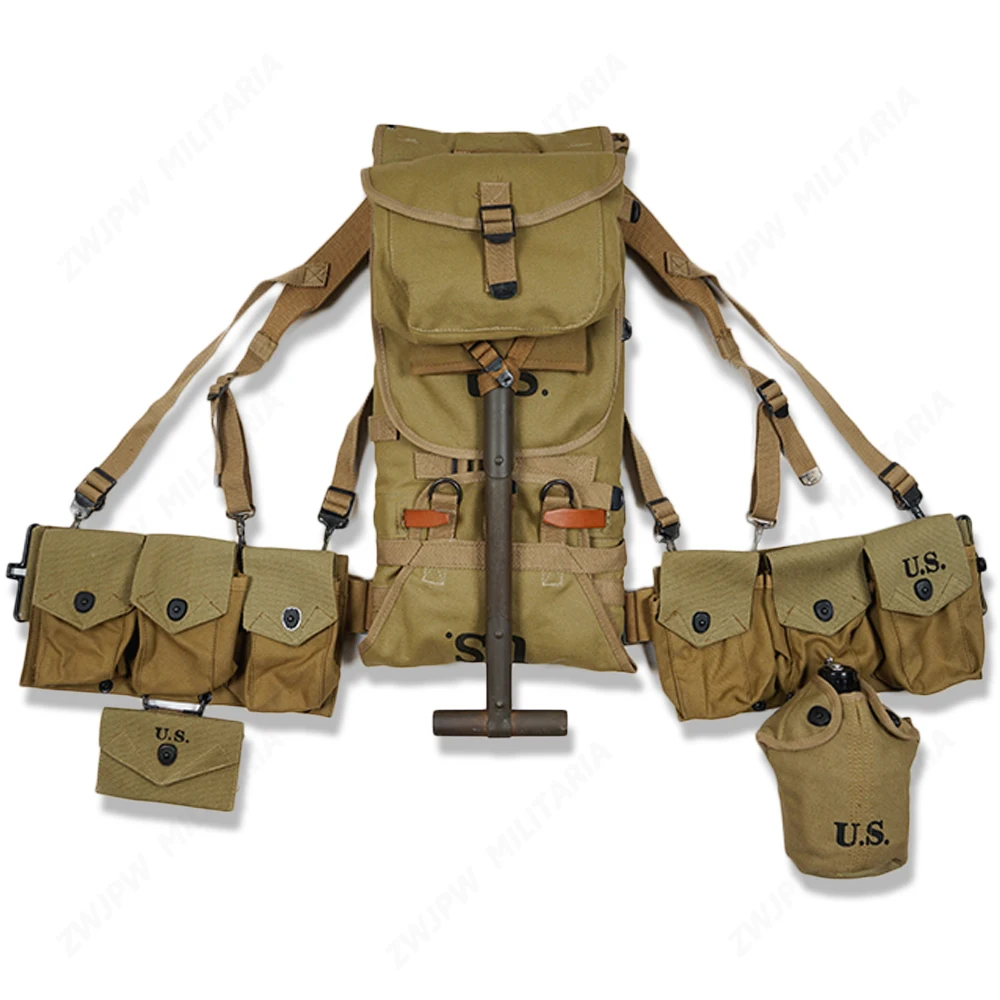 

WW2 US ARMY SOLDIER EQUIPMENT M1928 BAG BELT FIRST AID KIT AND 0.8L KETTLE X- TYPE STRAPS SIX CELL SHOVEL- World military Store