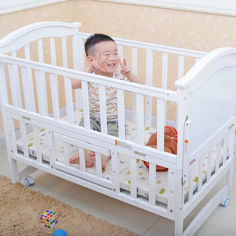 white and pine cot bed