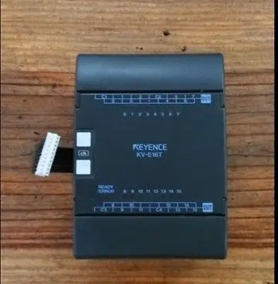 

2PCS KV-E16T PLC MODULE tested
