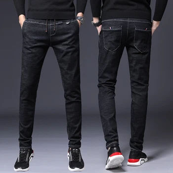 

Korean version of the trend loose waist jeans men slimming small pants Men's soil spring and autumn handsome black cow pants