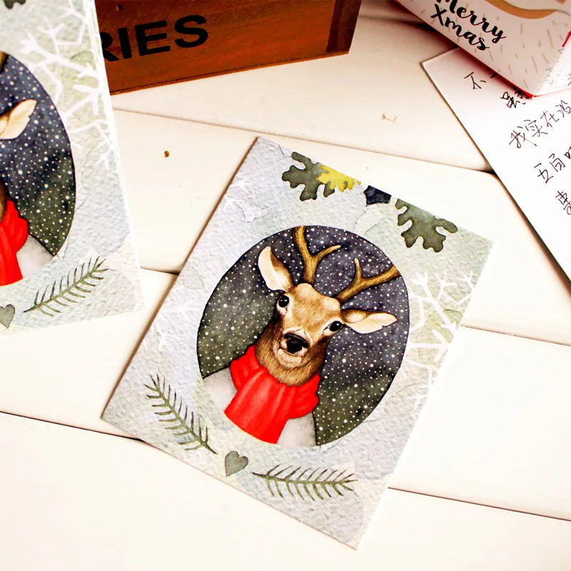 

Free Shipping 100pcs/lot Christmas Elk greeting Cards Blessing postcard sets Small Gift Greeting Cards Message Cards