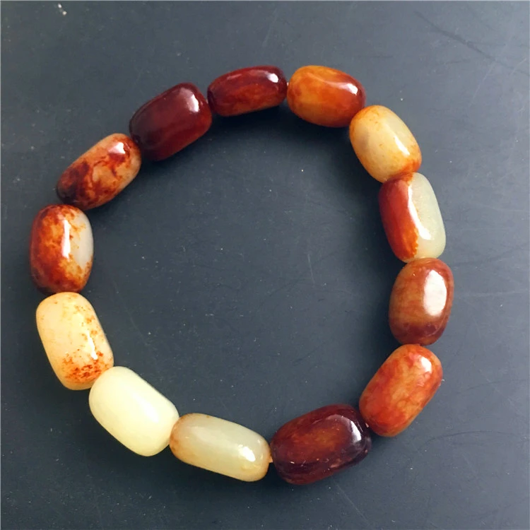 

Natural seeds of Xinjiang Hetian jade seed Carved beads Jade hand string A