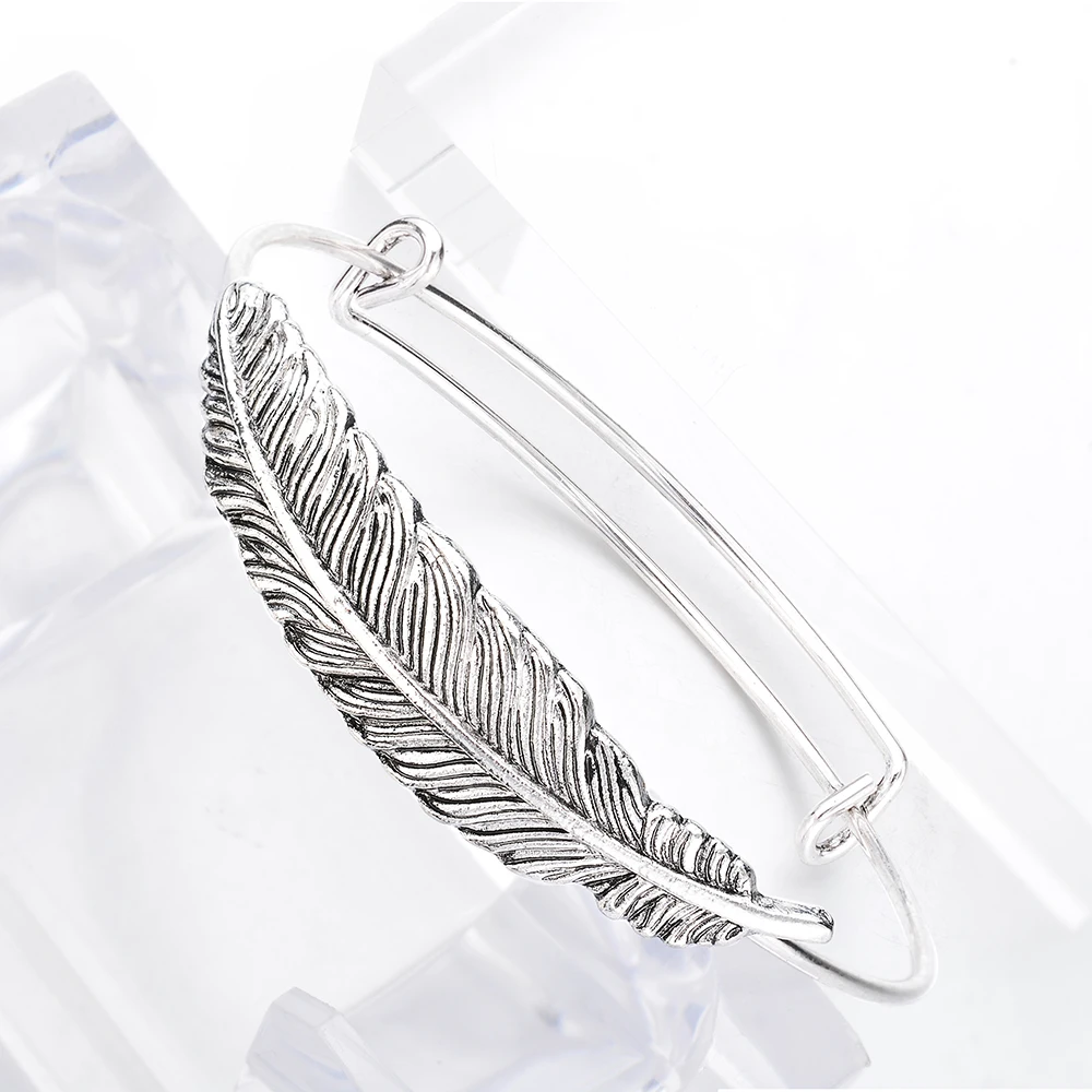 браслет перо серебро. браслет с перьями. браслет серебрянный перо. браслет. браслет с перьями серебряный.