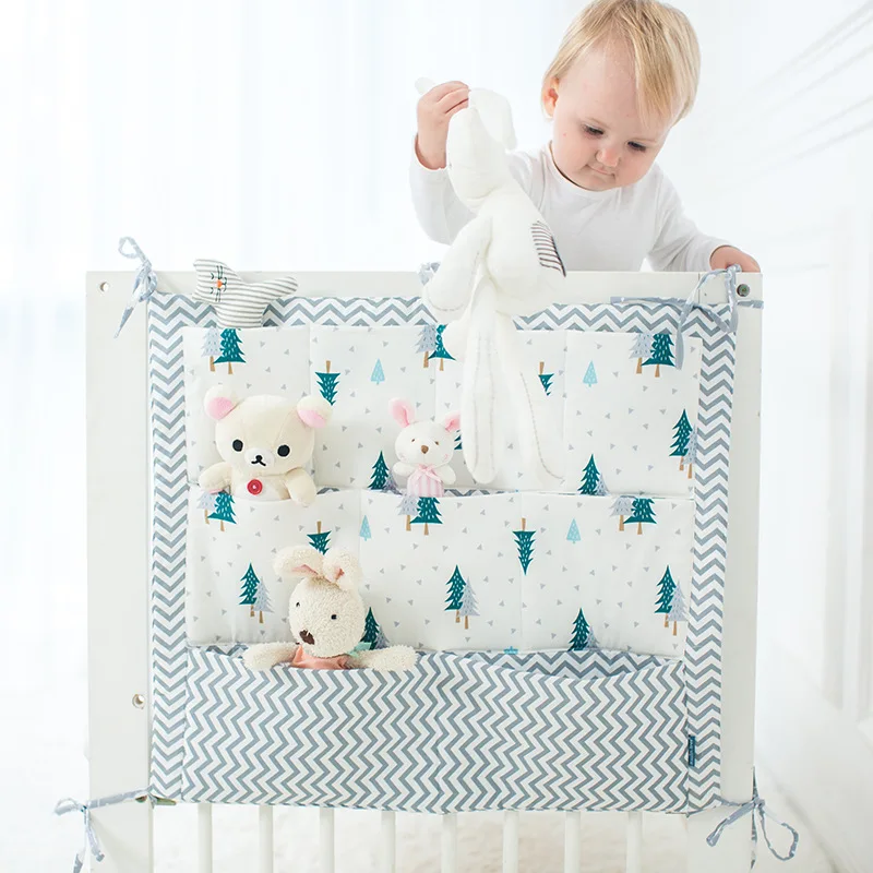 

Crib Baby Bed bumper Hanging Storage Bag Multi-functional muslin Baby Cot pocket Hanging Storage Bag Baby Bedding Bumper 55*60cm