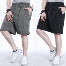 Летние новые стильные мужские большие свободные повседневные шорты с карманами с эластичной резинкой на талии высококачественные хлопковые Брендовые мужские супер большие размеры XL-6XL