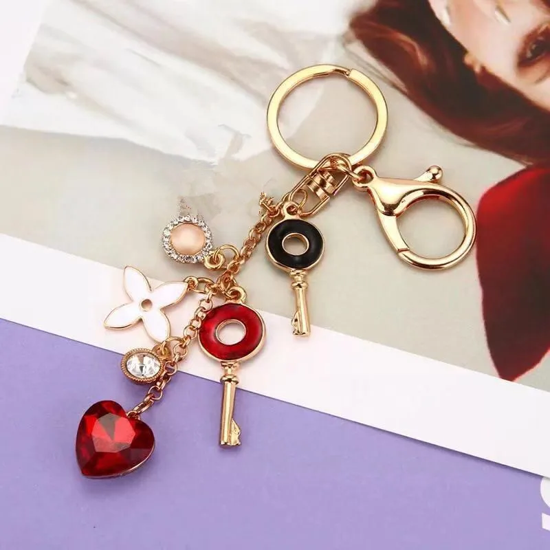 

Classic Fashion Crystal Clover Keychain Charm Jewelry Rhinestone Clover Car Key Ring Female Bag Pendant Accessories Key Pendant