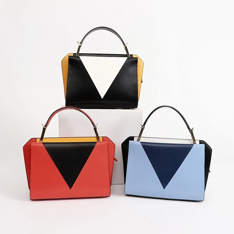 

2018 autumn and winter new leather handbags fashion contrast color wings handbags Europe and the United States style paralyzed