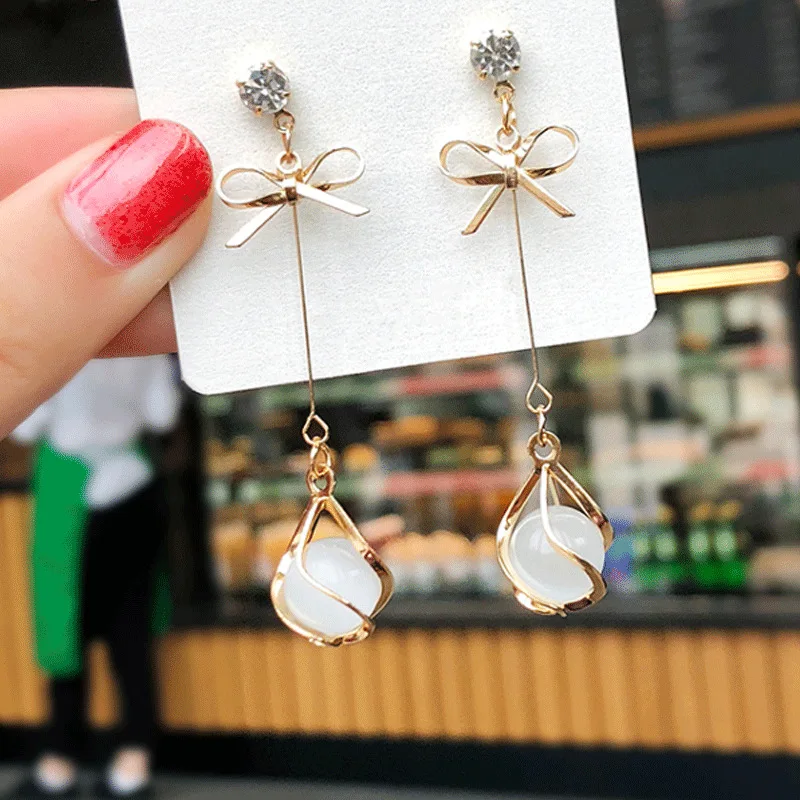 

Sells Hot New Earring Vogue Vogue Contracted Bowknot Tassel Female Earring Brincos Long Earring Temperament Earring Wholesale