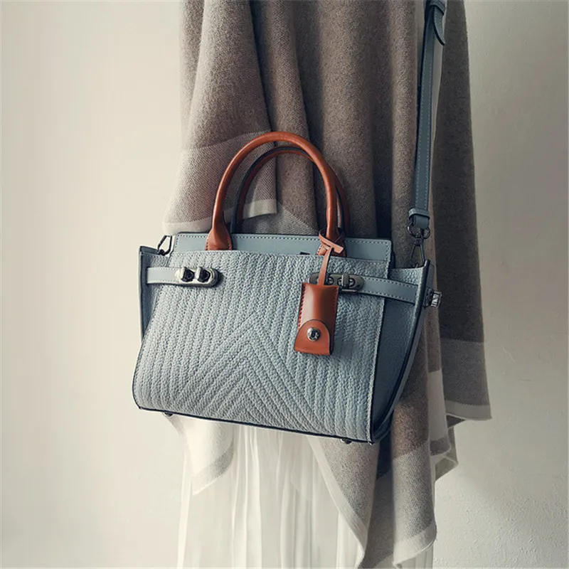 New Arrival Genuine Leather Women's Handbag Luxury Fashion Trapeze Leisure Messenger Bags