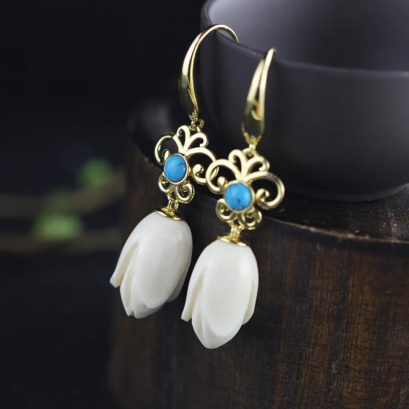 

Products New Mammoth Teeth Women's Fashion Aristocratic Temperament Female Gold Plated With A Hoard Of S925 Eardrop