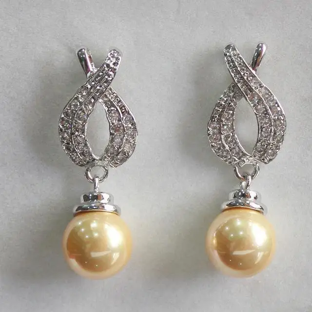 

HOT SELL - latest fashion lady's beautiful silver plated leave shape +12mm yellow shell pearl bread earring -Top quality free sh