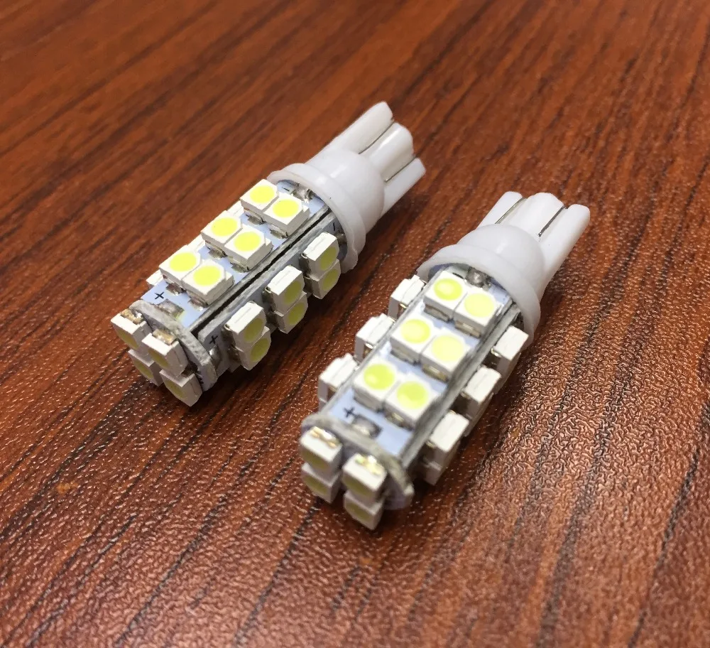 

2pcs Auto T10 LED 14W 1206 336-Lumen 6000K 28-SMD motive Design White Light Car Dashboard Lamps The width light (DC 12V / Pair)