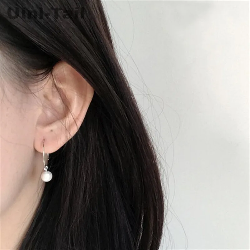 Серьги с жемчугом Uini Tail простые серьги большим кольцом подчеркивающие