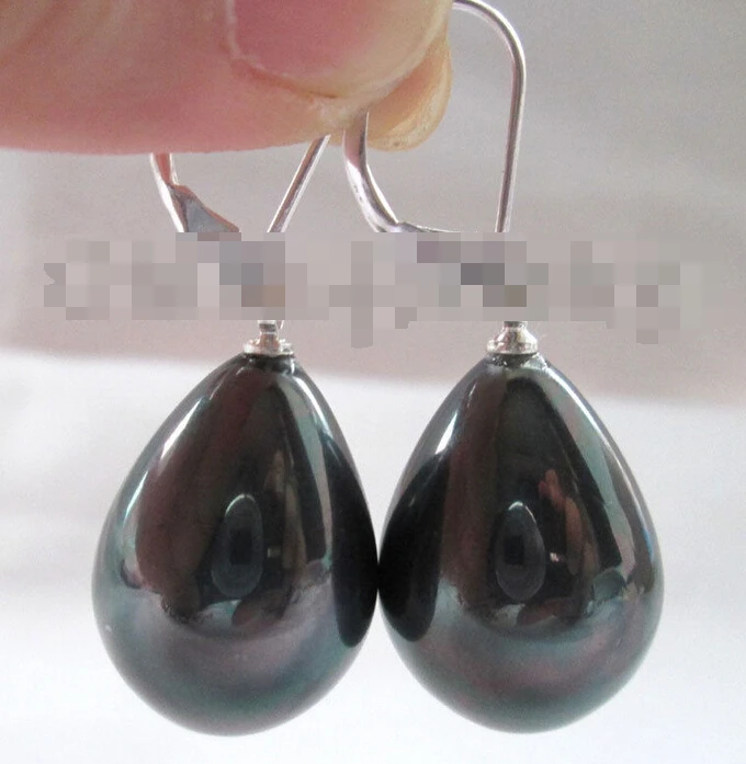 

1581 bright black drip south sea shell pearl earring