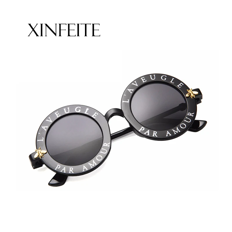 Солнцезащитные очки Xinfeite модные индивидуальные с буквенным принтом и круглой