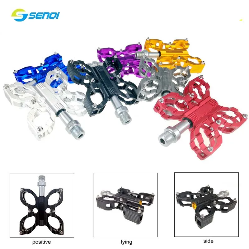 

Bicycle Bearing Butterfly Pedaled with the Foot Pedal of the Mountain Bike
