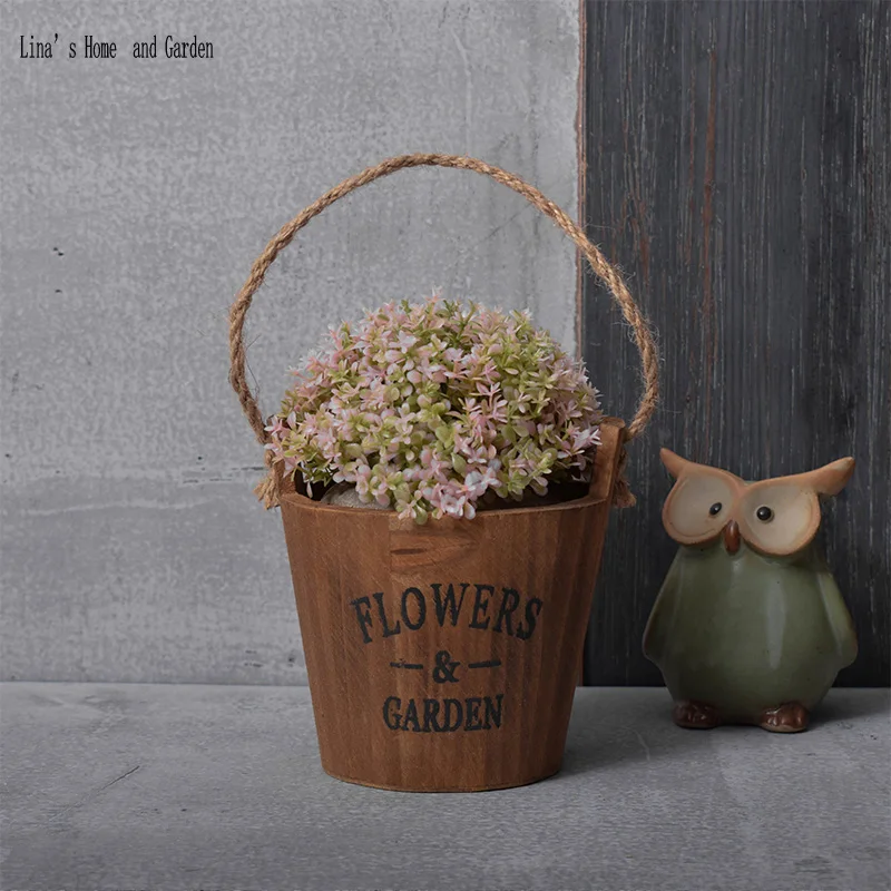 

antique brown handmade mini wooden barrel flower pots with hemp rope handle