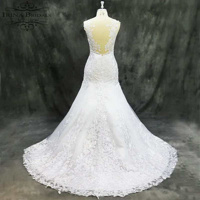 Свадебное платье с кружевной аппликацией Irina Bridals прозрачное рукавами крылышками