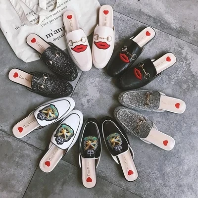 

2019 new baotou slippers women's flat shoes embroidered lazy Muller wild sandals