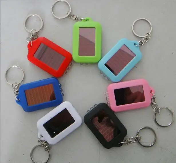 

100pcs/lot Original solar power Rechargeable several colors mini Torch Keychain LED Solar Flashlight