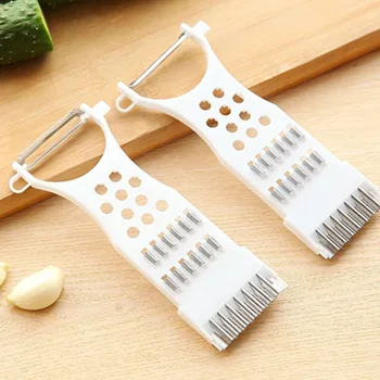 

Multifunctional four-in-one all vegetable slicer shredder plastic peeler potato shredder melon peeler