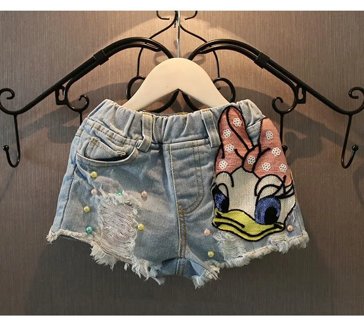 

Girls Cute Shorts Denim Cartoon Daisy Duck Hole Baby Ripped Jeans Short Pants Summer Sequin Pearls Kids Trousers Girl Clothes