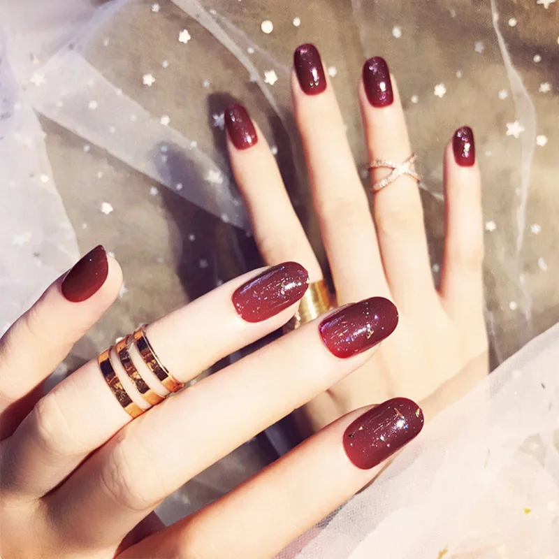 

Medium length fake nails Wine red rendering Glitter Almond Diy Nail Art Tip Accessory 24 PCS Phototherapy Fake nails with glue