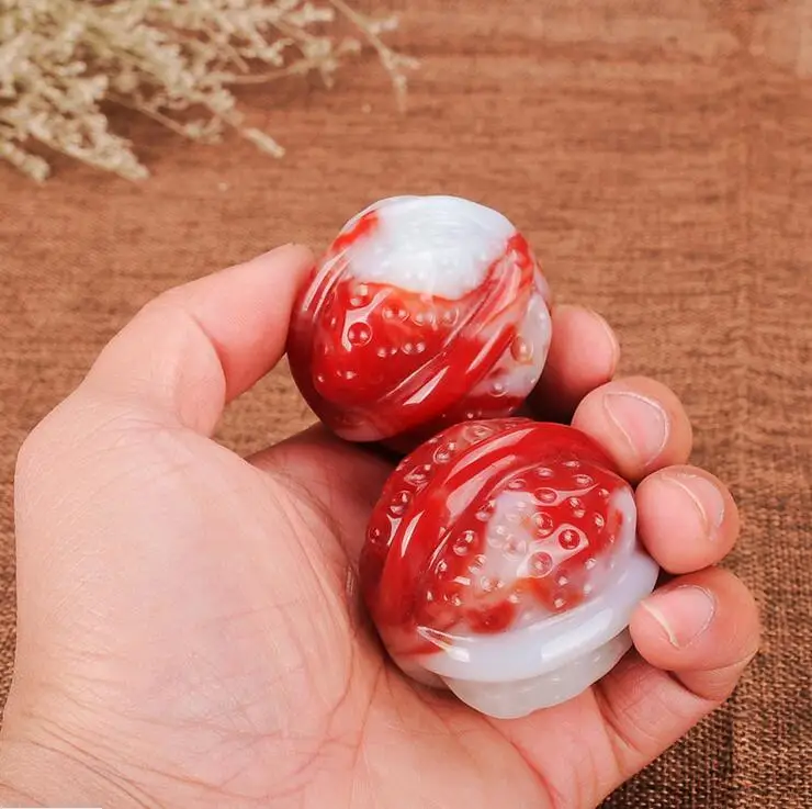 

Walnut pieces of natural Gobi bloodstone walnut hand piece Xinjiang Jinsi jadeite chicken blood red hand piece